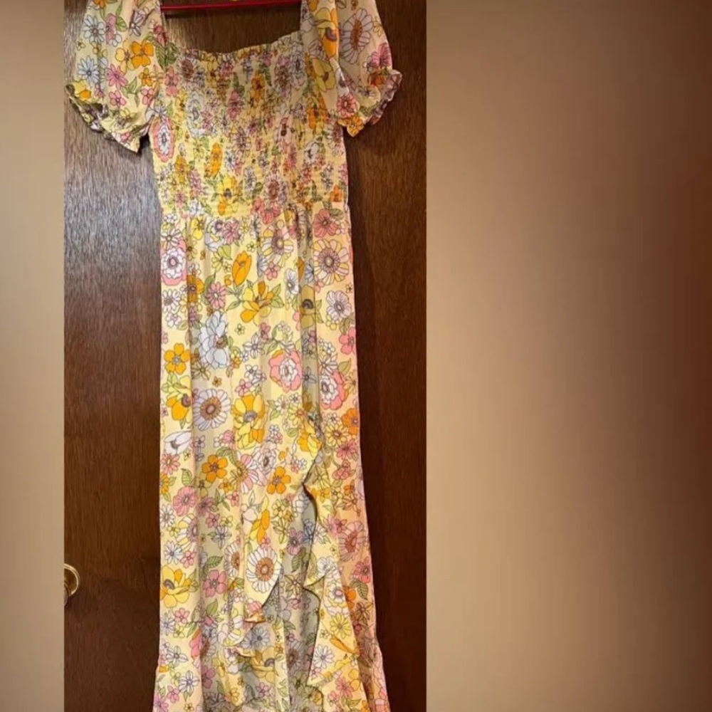 Women’s Crystal Doll Dress Has a black spot . NWOT